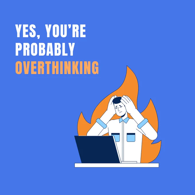 A person overthinking in front of a laptop with a flame in the background.