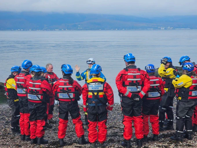 A Coastguard Rescue Team during a briefing as part of a water rescue exercise