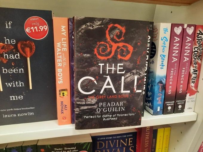 The Call by Peadar Ó Guilín sitting on a shelf at Easons, Tallaght, Dublin.