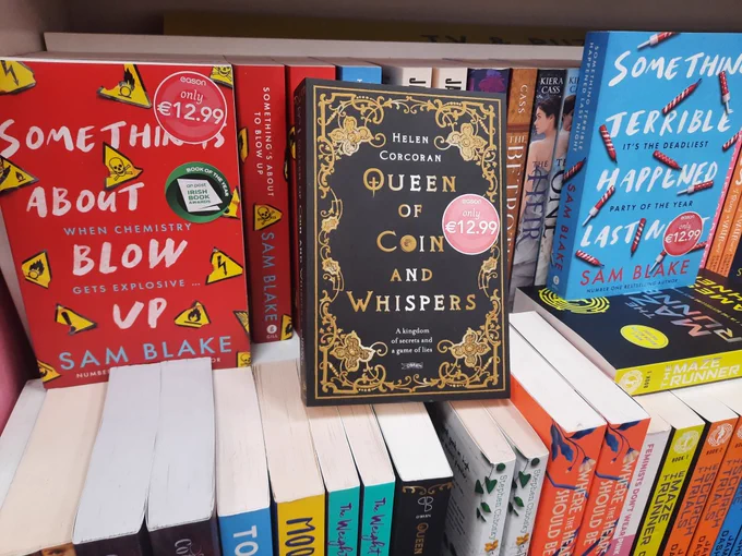 Queen of Coin and Whispers by Helen Corcoran sitting on a shelf at Easons, Tallaght, Dublin.