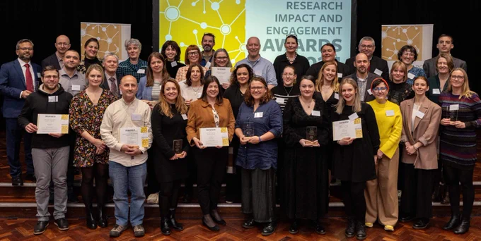 All the Research Impact and Engagement Award 2024 winners lined up on stage