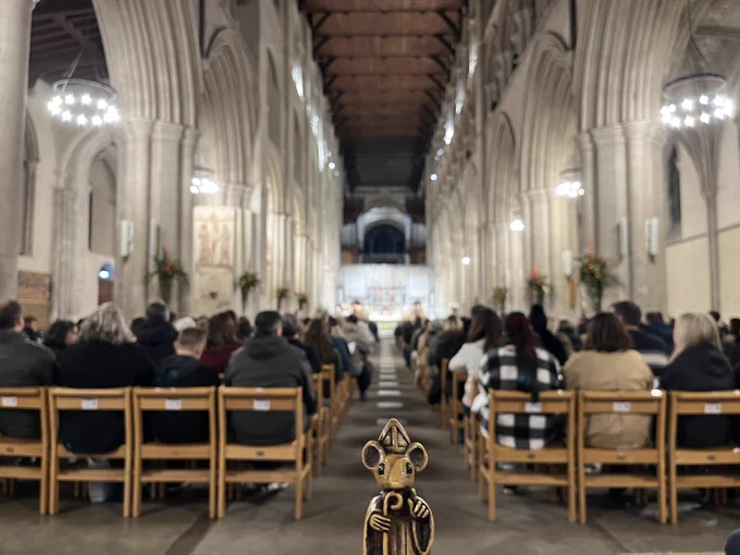 The mouse at a Carol service in the nave of St Albans cathedral.