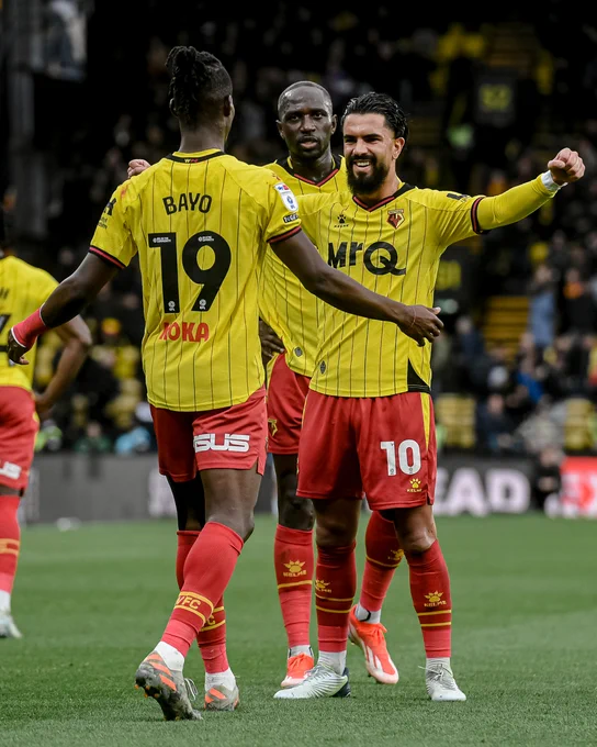 Watford men's side celebrate victory over West Brom.