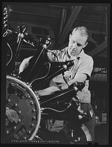 A worker on the final assembly of a WASP engine in the East Hartford plant, 1940
- Library of Congress, Prints and Photographs Division