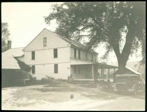 A two-story frame house in the Hartland Hollow area which was flooded when the Barkhamsted Reservoir was completed – Connecticut Historical Society