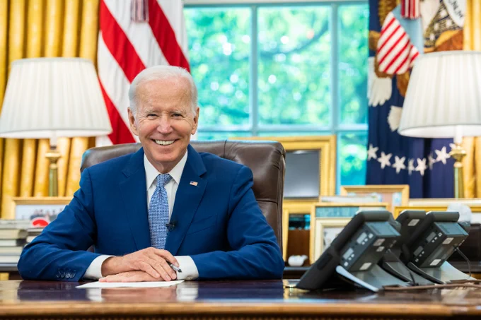 President Biden is pictured in the Oval Office.