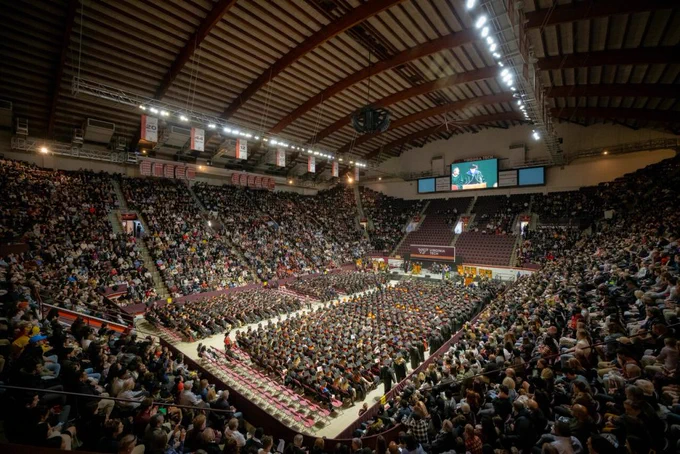 Friends, families, and graduating Hokies gather in Cassell Colosseum for fall commencement 