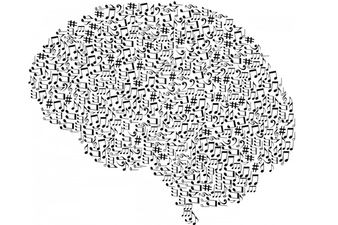 Various music notes and music theory symbols making the shape of the human brain.
