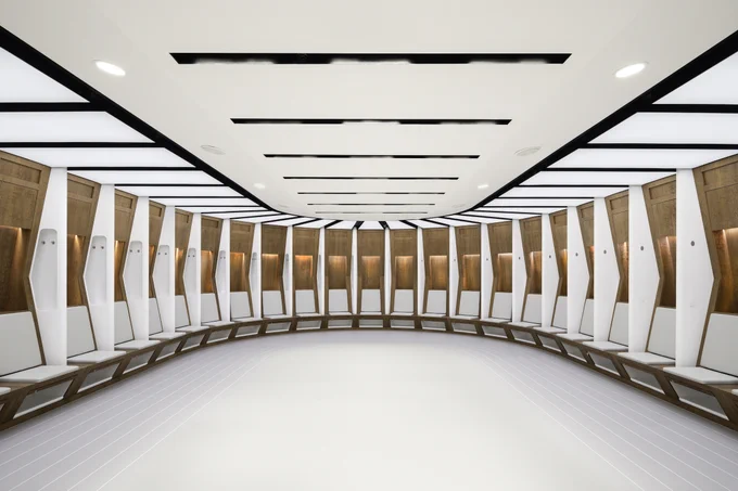 Changing rooms at Wembley Stadium, London, United Kingdom. Winner at Surface Design Awards. Lighting design for commercial projects, brands, architectural lighting design, interior lighting design, Lighting schemes for projects in the UK, United States, Europe and Middle East. Design from Award-winning Lighting consultants Michael Grubb Studio
