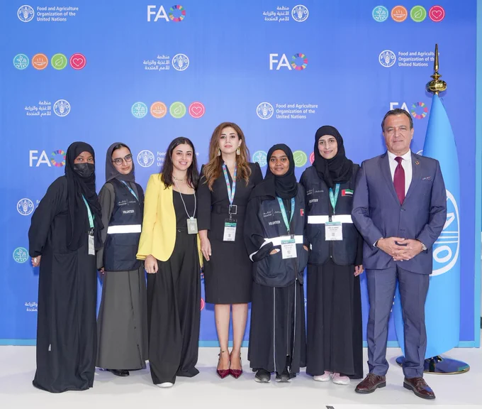 The FAO Subregional Office for the GCC States and Yemen team, led by Head of Mission (left), alongside dedicated volunteers from Emirates Foundation during the Global Food Week exhibition at ADNEC, Abu Dhabi.©️FAO,2024.