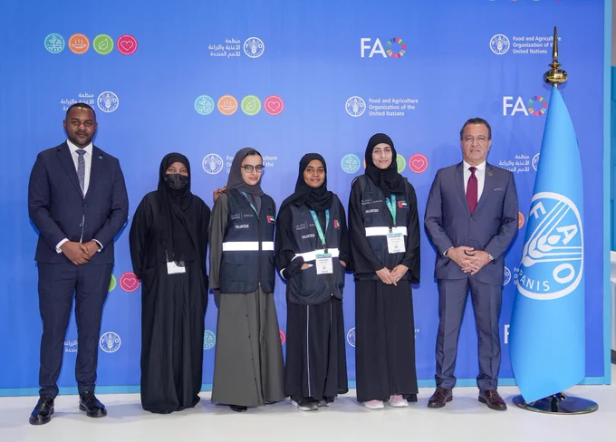 The FAO Subregional Office for the GCC States and Yemen team, led by Head of Mission (left), alongside dedicated volunteers from Emirates Foundation during the Global Food Week exhibition at ADNEC, Abu Dhabi.©️FAO,2024.