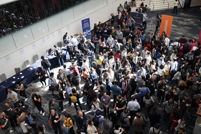 Crowd of people at a conference.