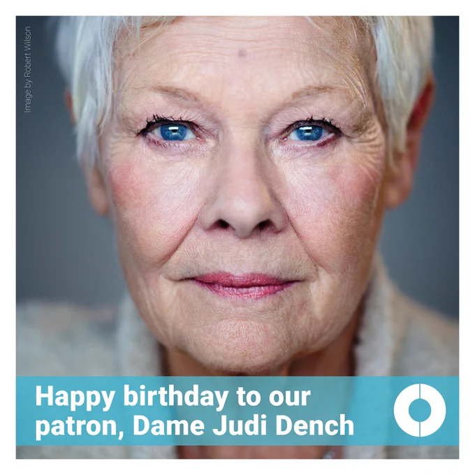 Image shows a close-up head and shoulders photograph of Dame Judi Dench looking straight at the camera. At the bottom of the image are the words, 'Happy birthday to our patron, Dame Judi Dench.' The OnePlusOne logo appears in the bottom right-hand corner.