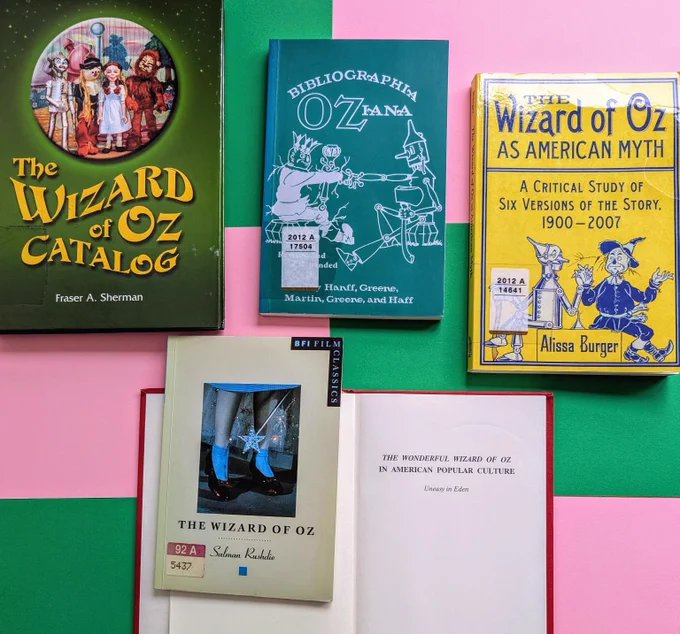 A flatflay of 5 books on "The Wizard of Oz"