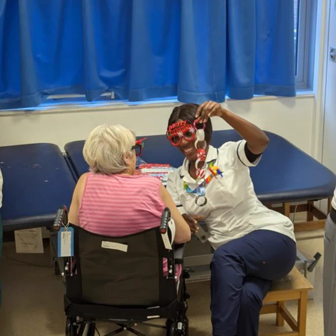 UHS stroke rehab staff doing Christmas-themed activities with patients.