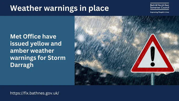 A warning sign in front of dark clouds and rain.