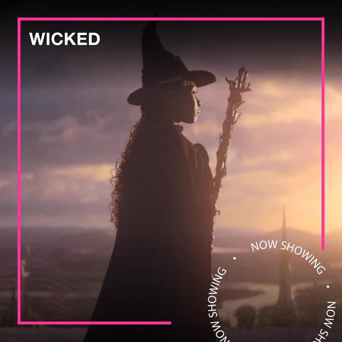 A witch wearing a witch's hat and holding a broomstick stands looking out at a vast landscape. Text - Wicked, Now Showing