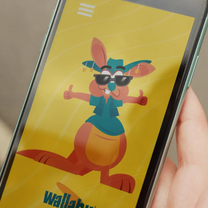 Still from Secrets of a Wallaby Boy: Bruce the animated wallaby (voiced by Colin Baker), on a mobile phone screen, with sunglasses and thumbs up.