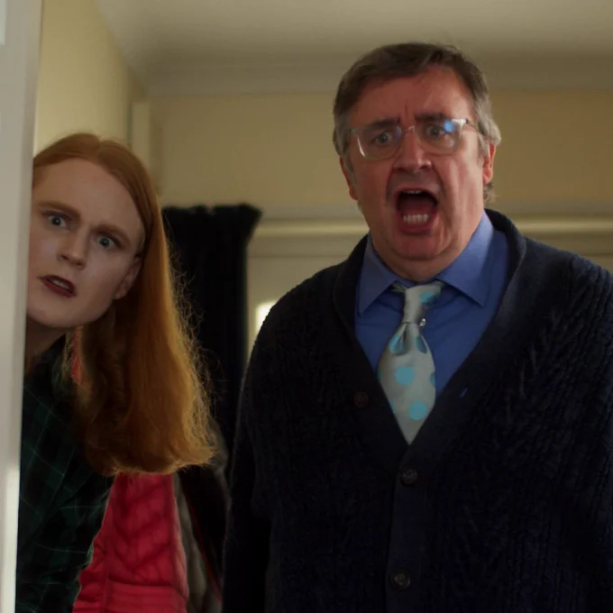 Still from Secrets of a Wallaby Boy: Jade (Billie Hindle) and Roland (Mark Benton) look shocked.