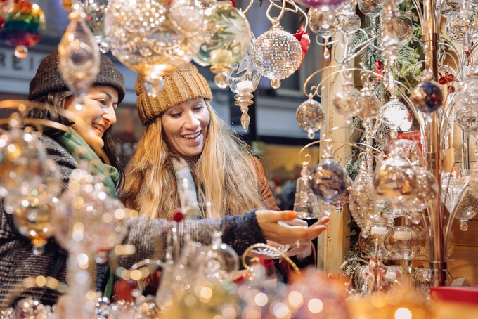 lady looking at market stall