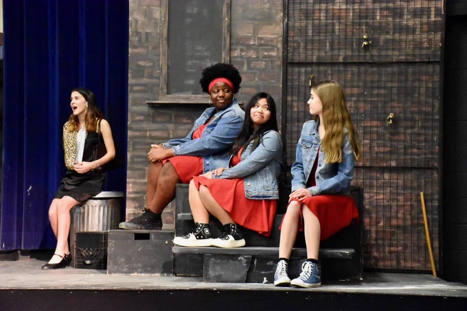 Regiopolis-Notre Dame students perform musical scene from their school production of Little Shop of Horrors.
