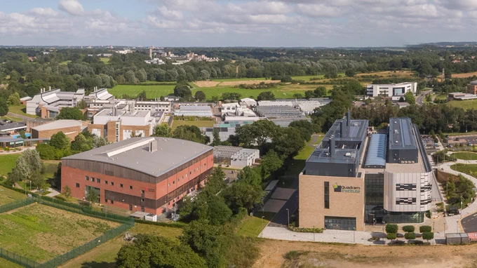 Aerial photograph of the Earlham Institute, Quadram Institute, John Innes Centre and The Sainsbury Lab, on the Norwich Research Park. Image credit: Anglia Innovation Partnership.