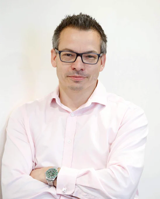 A headshot of the current CEO of Enfield Council, Mr Ian Davis.