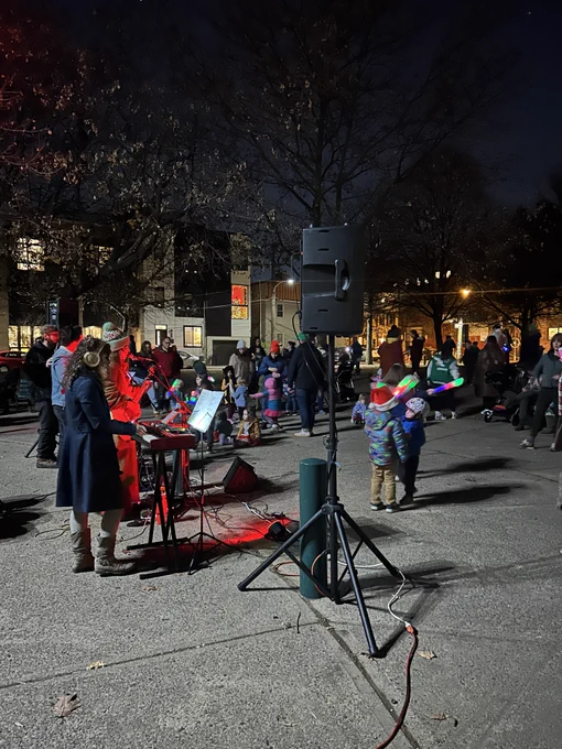 Local band Miss Cantaloupe performs during the Winter Holiday Singalong in Konrad Square