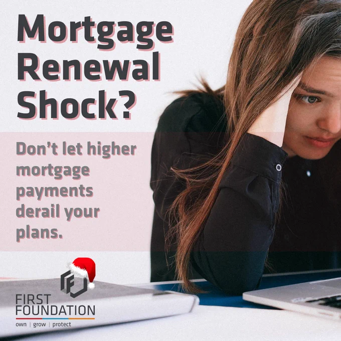 A concerned homeowner sits at a modern kitchen table, reviewing financial documents and using a laptop.