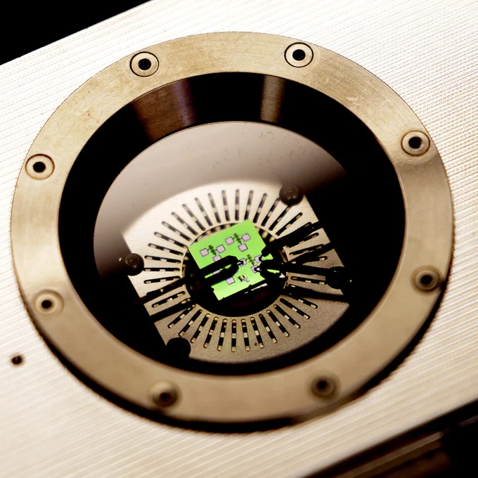 The memory devices fabricated using tantalum oxide on this chip can store data for both conventional memory and in-memory computing above 1000°F. Image credit: Brenda Ahearn, Michigan Engineering