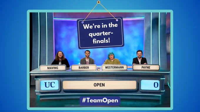Team Open smiling at camera on the set of University Challenge, from left to right Maving, Barber, Westermann, Payne. A blue border is around the image with text reading ‘We’re in the quarter-finals! #TeamOpen’.