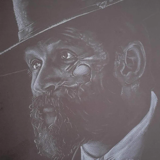 Drawing of Tom Hardy as character Alfie in the show "Peaky Blinders". White chalk on brown paper.