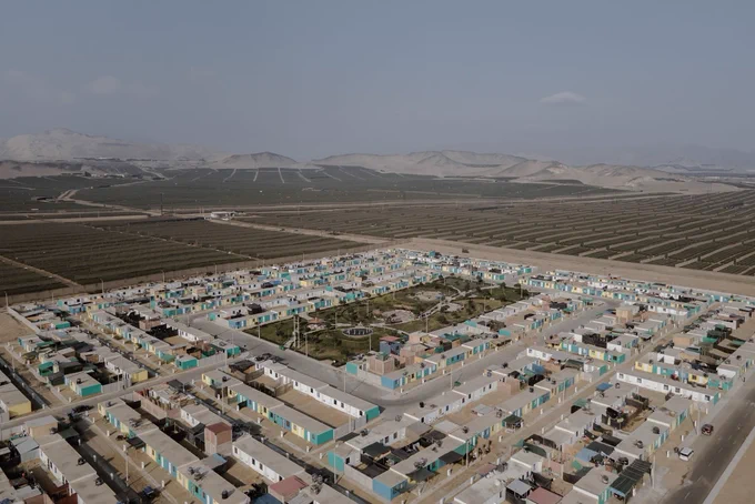 #Accessibiliy: The small town of Malverde is shown from an Ariel view. This town has grown with the burgeoning berry industry.