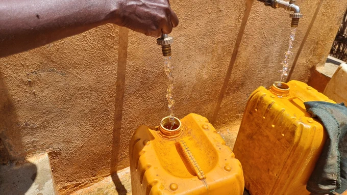 Visiting a water project for displaced people on the outskirts of Baidoa. Somalia Resilience Program, a collective effort of seven international and national NGOs, has raised $151 million since 2012. 