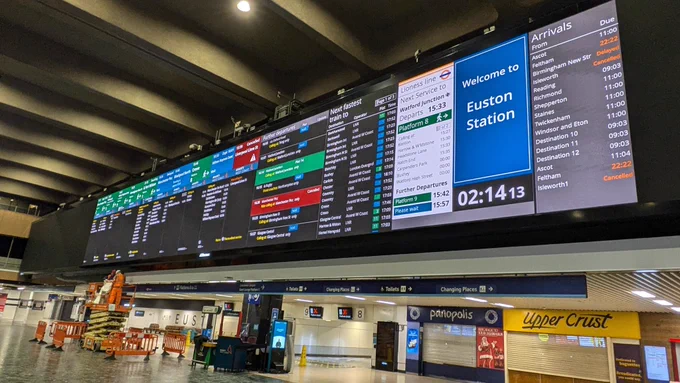 A photograph of the large screen at London Euston station which was previously used for advertising - train information is being tested on the screen