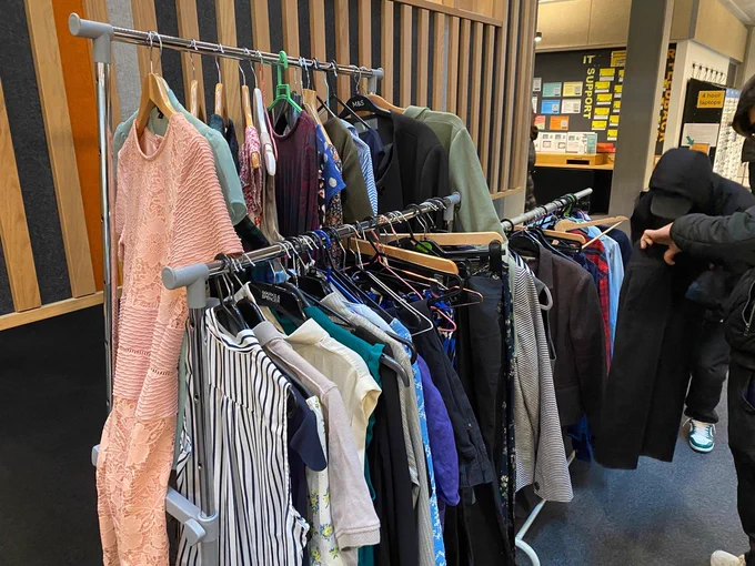 Clothing rack showcasing variety of items