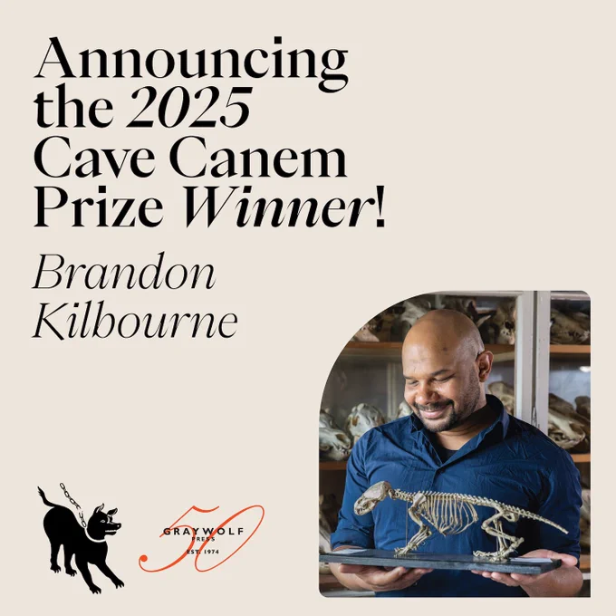 A promotional graphic announcing the 2025 Cave Canem Prize winner. Black text on a light beige background reads: "Announcing the 2025 Cave Canem Prize Winner! Brandon Kilbourne." In the lower-left corner are the Cave Canem logo, featuring a black dog with a broken chain, and the red Graywolf Press 50th Anniversary logo. To the right is an image of Brandon Kilbourne, a light-skinned bald Black man in a dark blue button-up shirt, smiling as he holds a small skeletal model of an animal. Shelves filled with skeletal specimens are visible behind him.