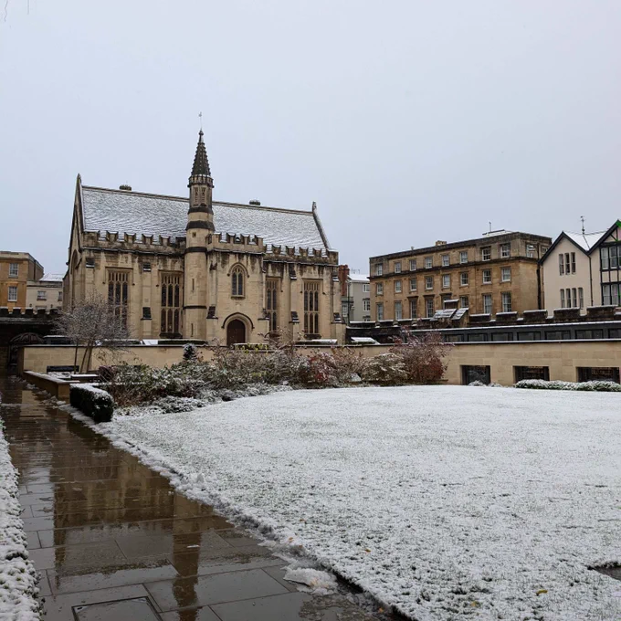 Longwall Quad in the snow, with the Library in the background. The lawn is covered in snow.