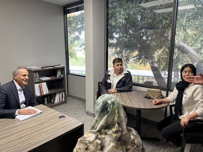 Deputy Secretary Verma interacts with a newly resettled refugee family at Catholic Charities Dallas in Dallas, Texas.
