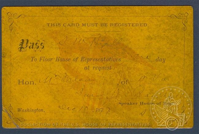 orange printed paper with faded writing

