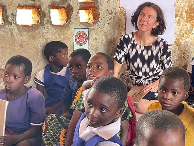 Anneliese Dodds in a classroom with Malawian schoolchildren