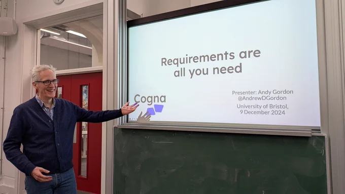 Andy gesturing at his title slide