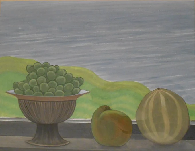 Still life composition in muted tones of green, brown and grey. A fluted brown bowl on a stand contains green grapes piled high and two other large, rounded fruits sit on the window ledge. The edge of a rolling green landscape can be viewed outside the window with a calm blue sea beyond. 