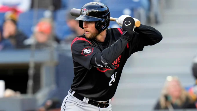 Gage Workman bats from the left side in a black Erie SeaWolves jersey