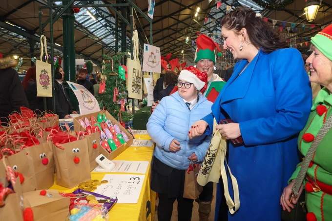 Deputy First Minister Emma Little-Pengelly with pupils from Knockevin Special School, Downpatrick, at the Young Enterprise Big Market.