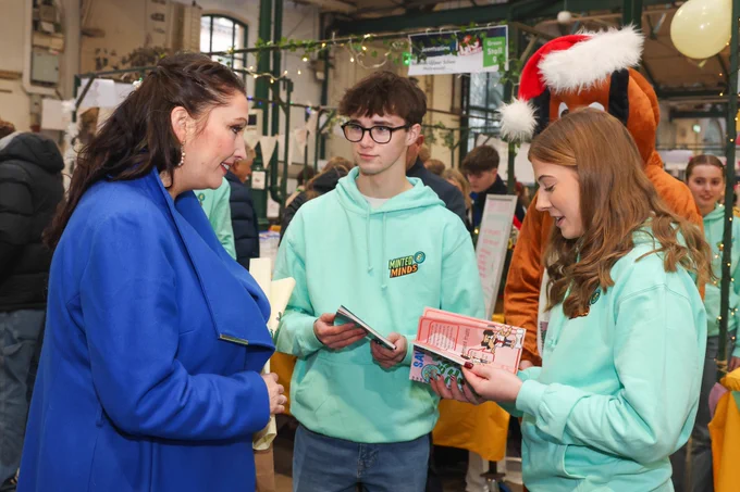 Deputy First Minister Emma Little-Pengelly with pupils from Omagh Academy, Omagh, at the Young Enterprise Big Market.