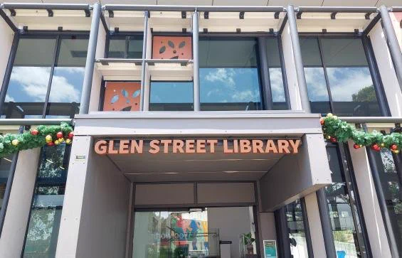 The exterior of Glen Street Library with Christmas decorations.