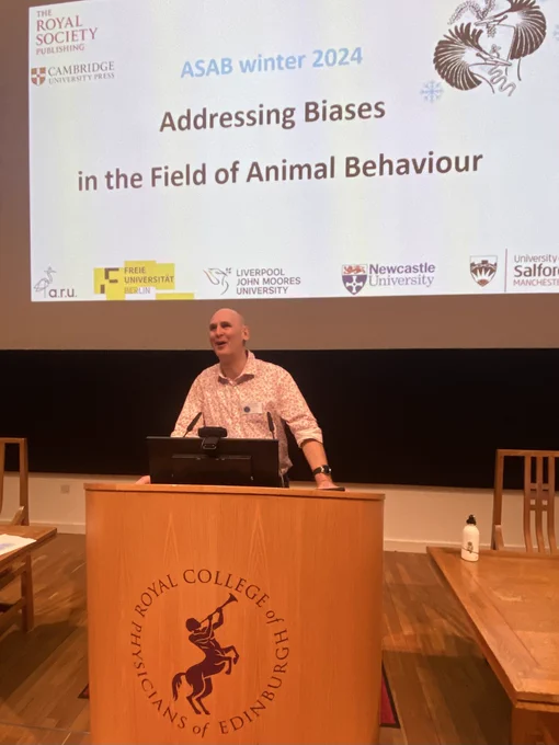 Jo giving remarks at a lectern in front of a slide reading ASAB winter 2024
Addressing Biases
in the Field of Animal Behaviour