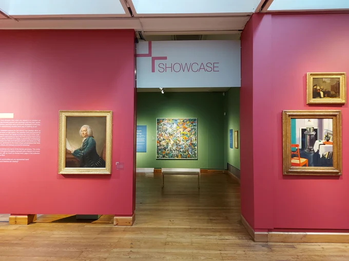 Paintings on the wall in the Hunterian Art Gallery.