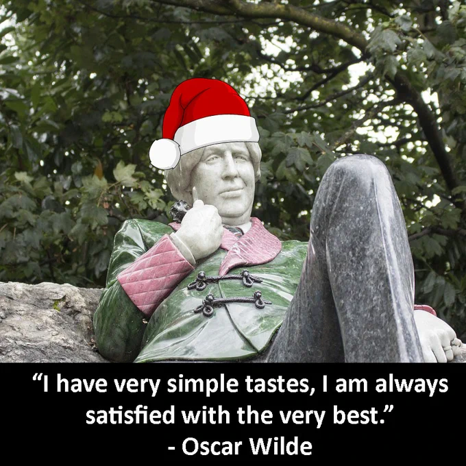 Statue of Oscar Wilde in Dublin. A Santa hat has been photoshopped on Oscar's head. At the bottom a quote from Wilde reads: “I have very simple tastes, I am always satisfied with the very best.”